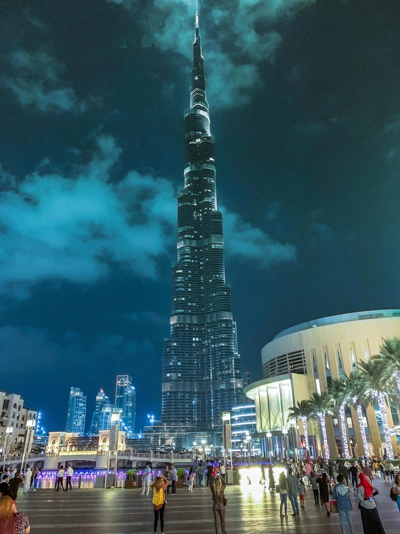 The Burj Khalifa lit against the night sky above downtown Dubai